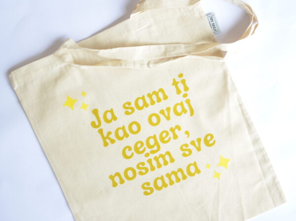 Ceger sa natpisom - "ja sam ti kao ovaj ceger nosim sve sama"